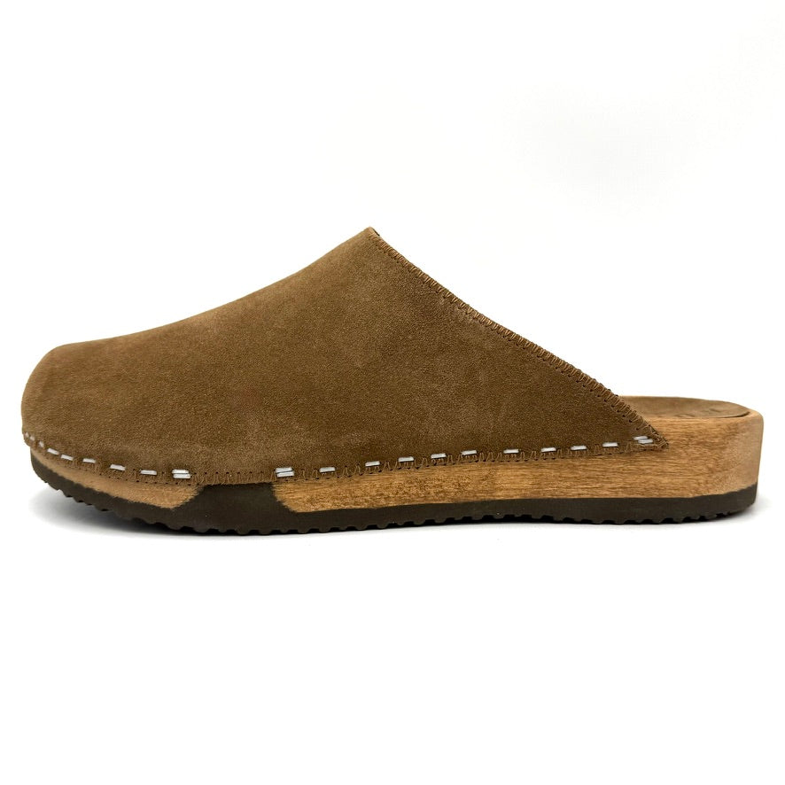 Brown suede clog shoe on a white background