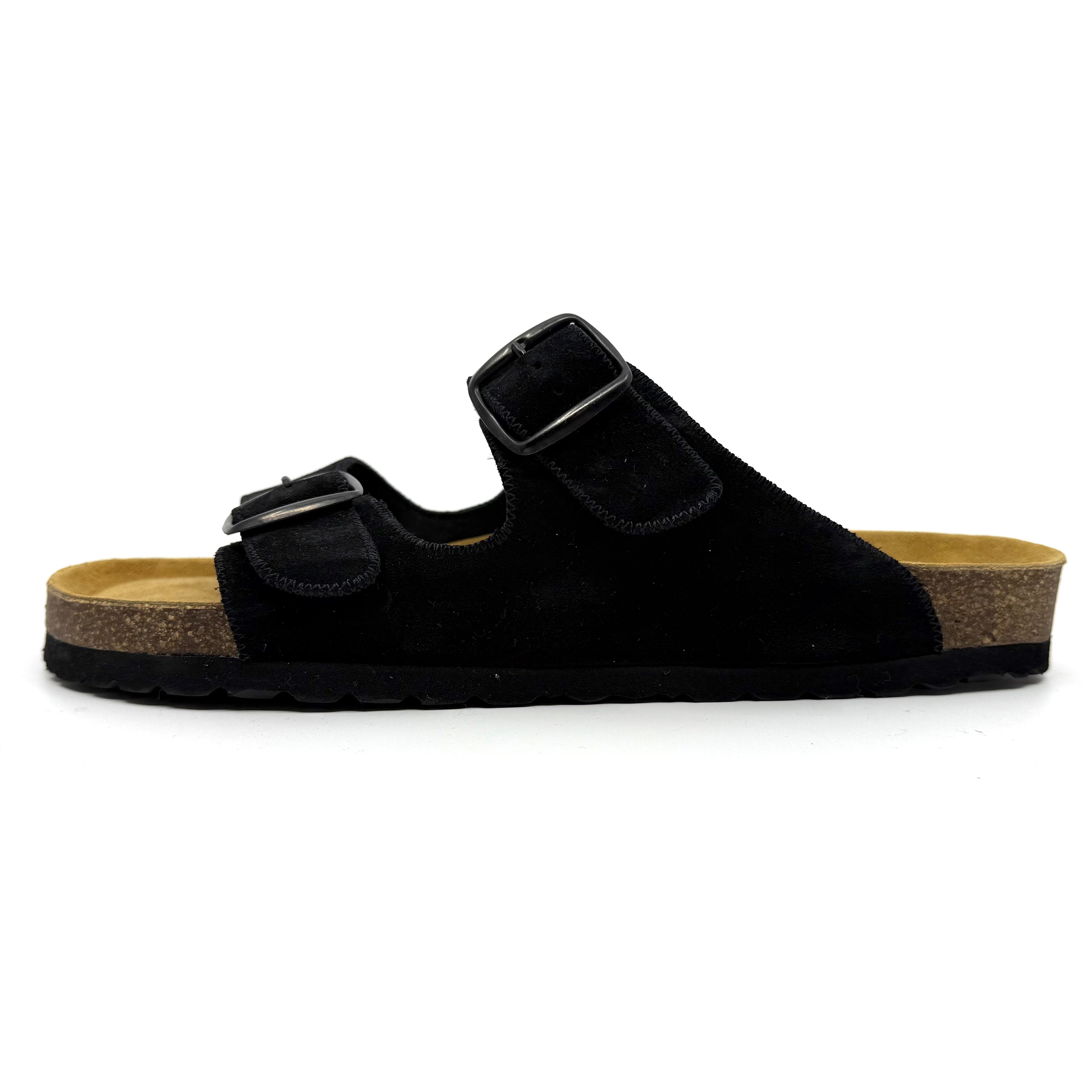 Black sandal with a cork sole on a white background