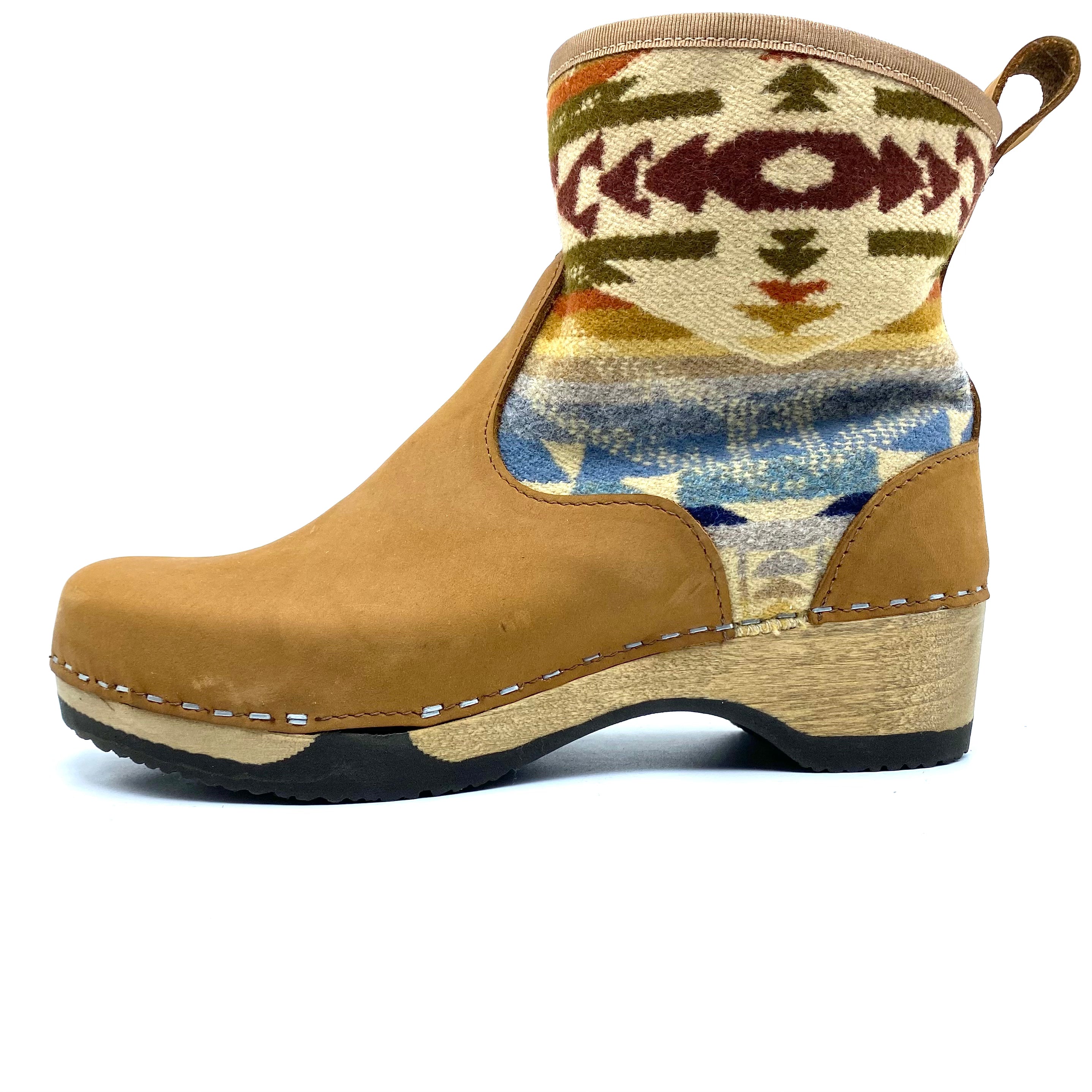 Tan boot with patterned upper on a white background