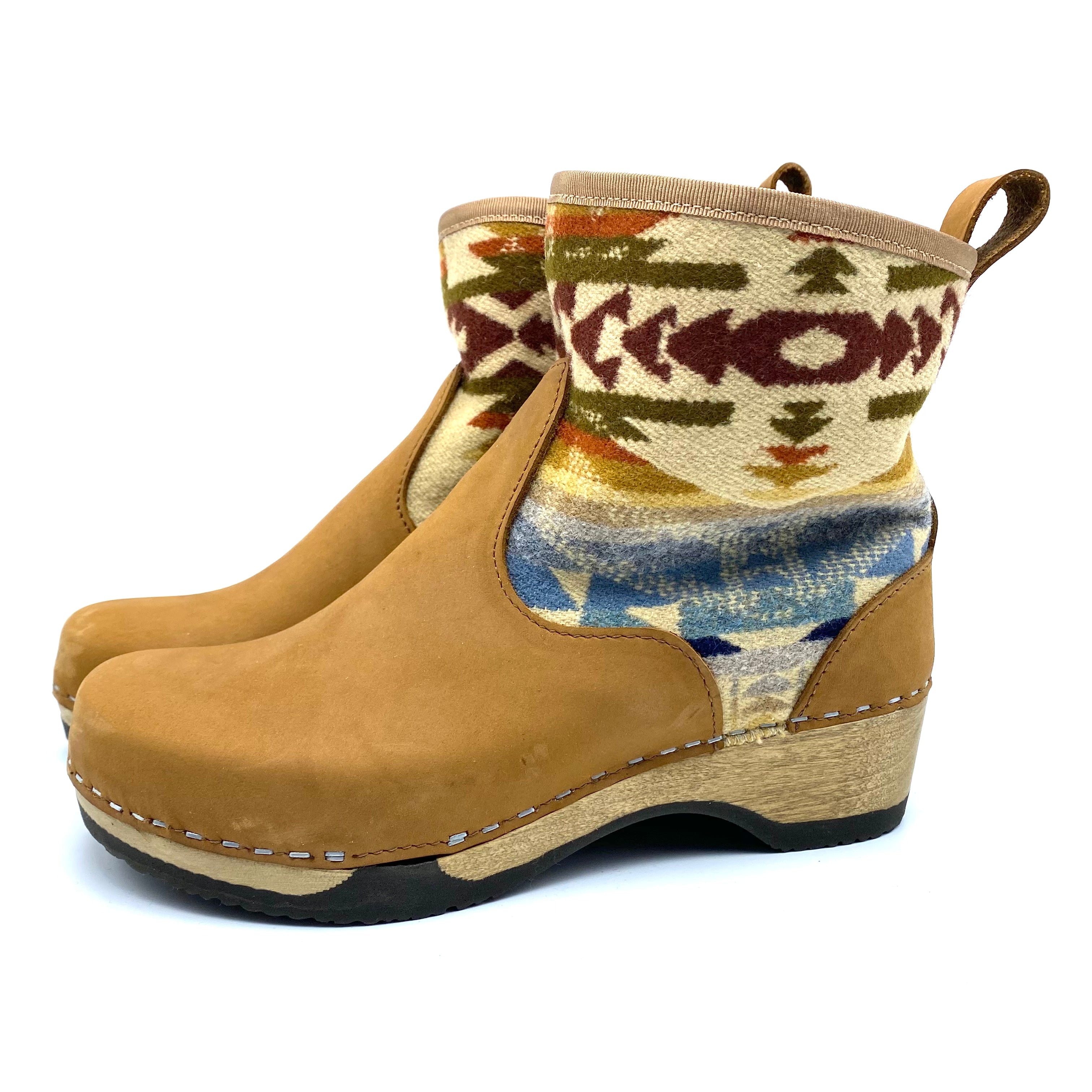 Tan boot with patterned upper on a white background