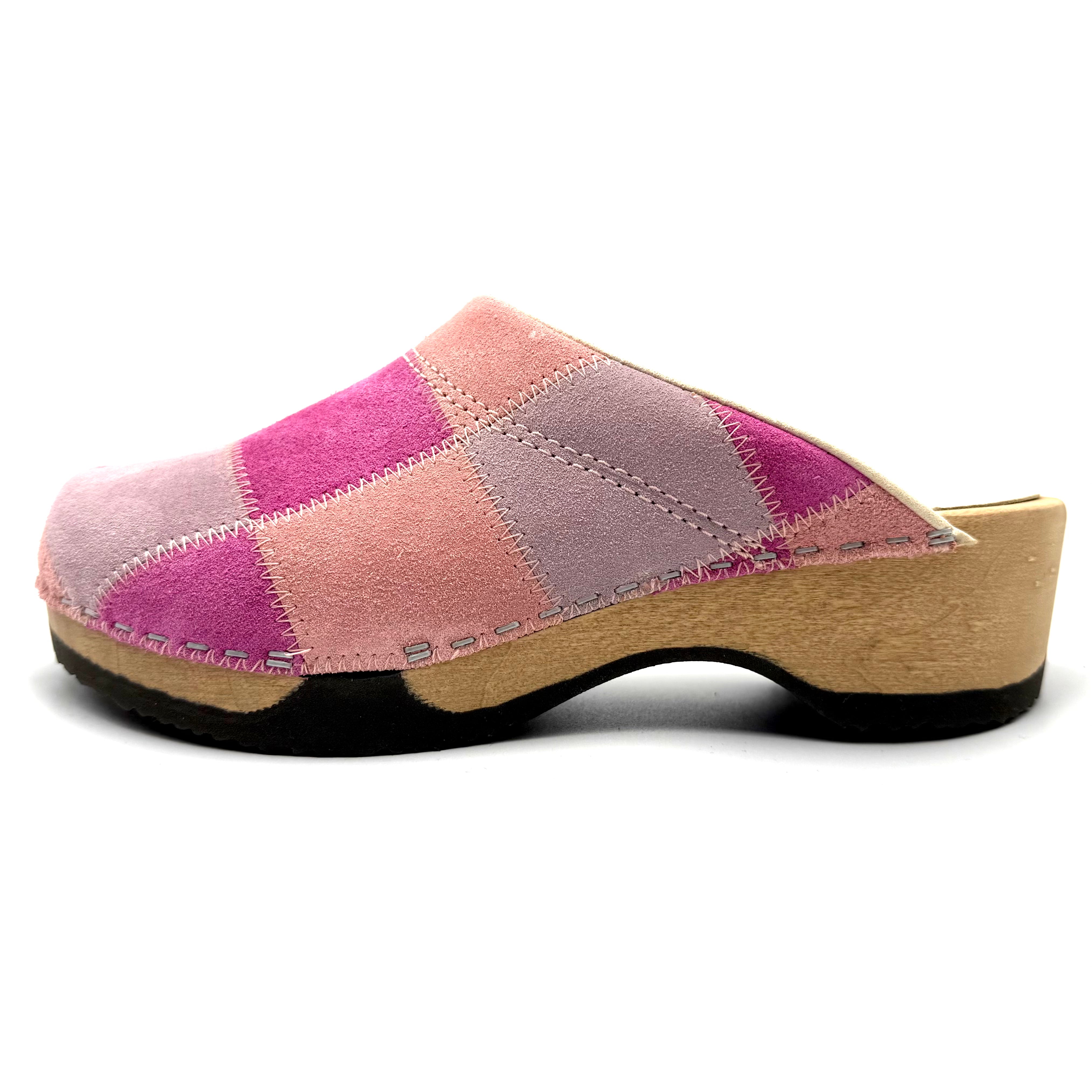 Pink and beige patchwork clog shoe on a white background