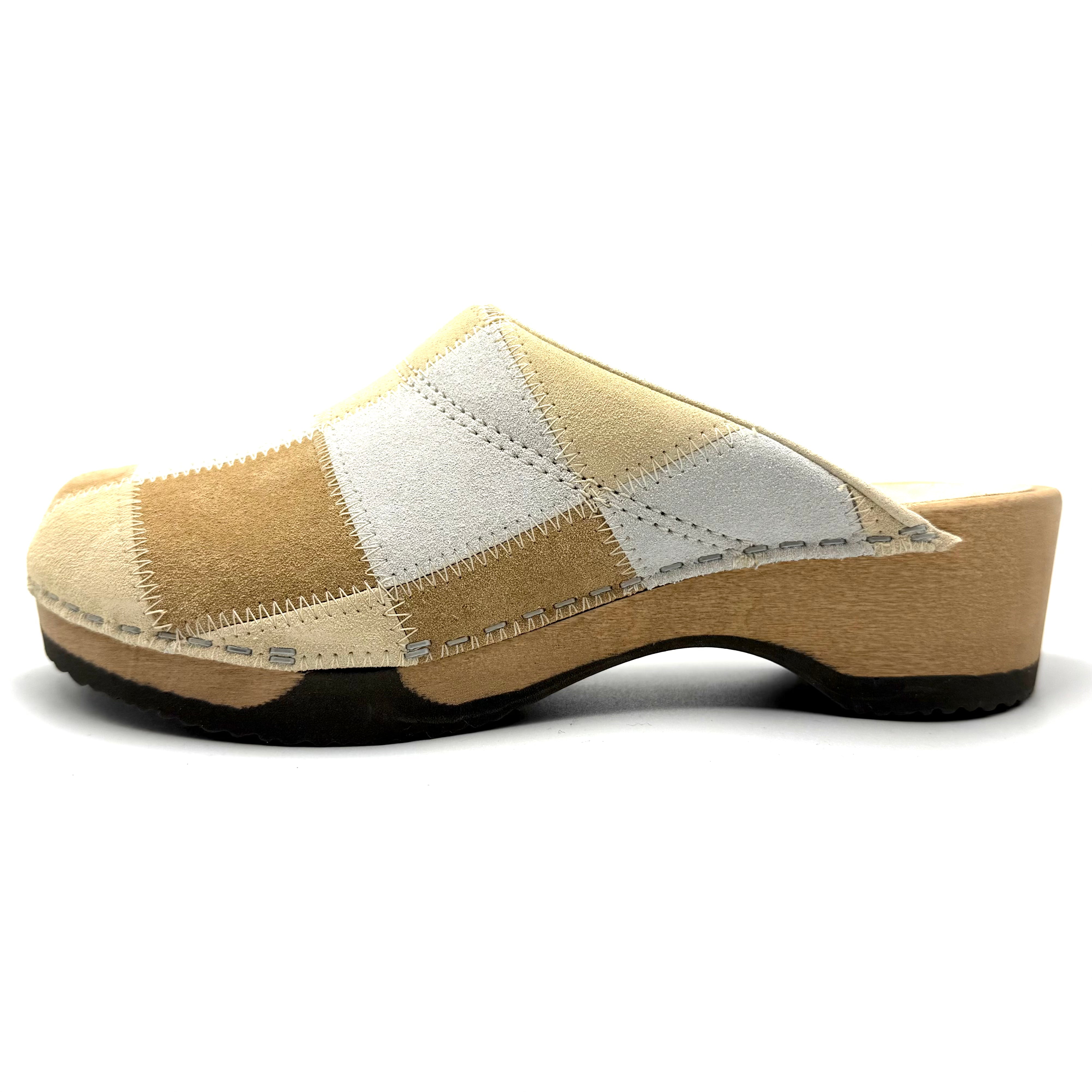Beige and white checkered clog shoe on a white background