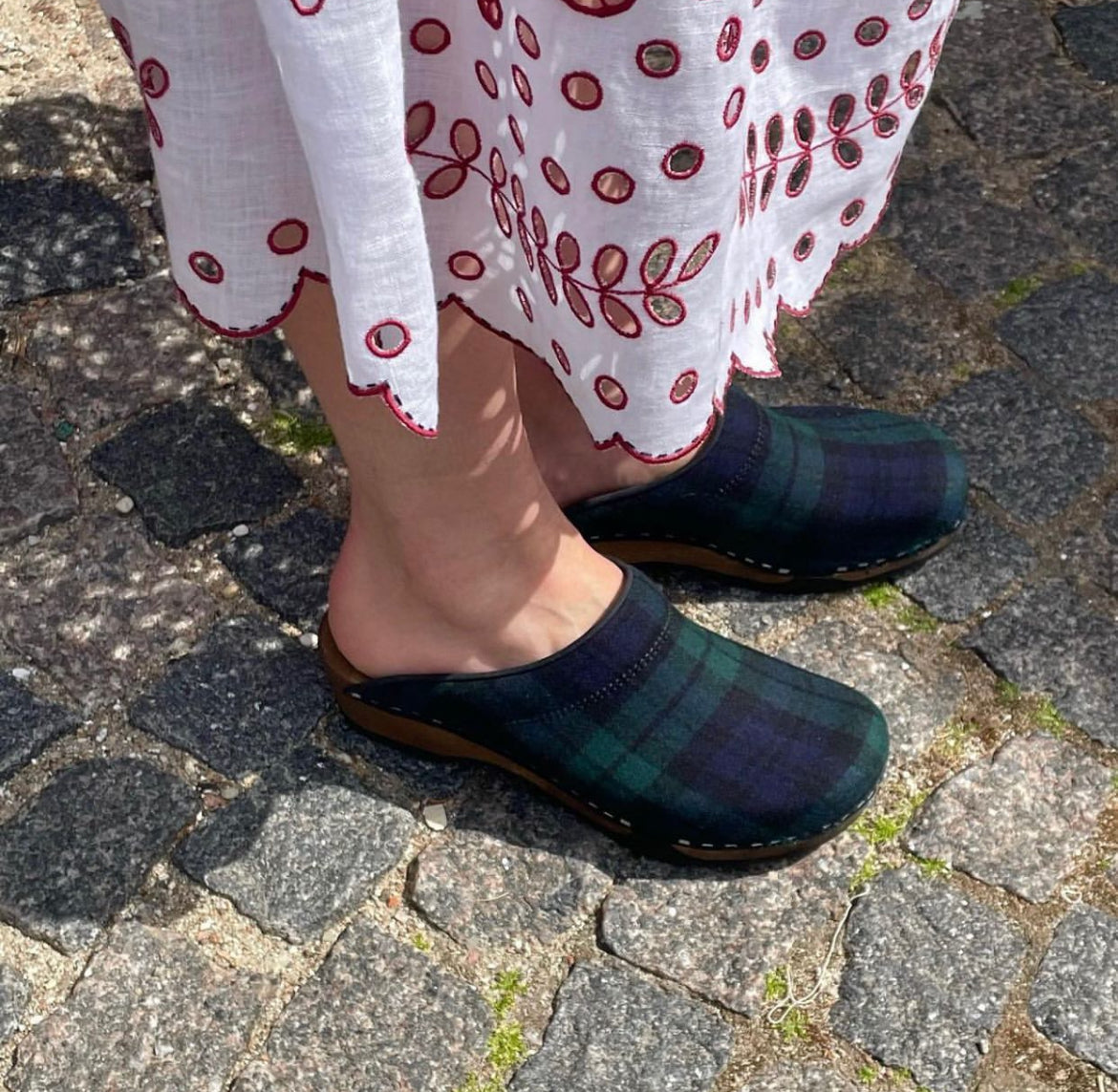 Blue plaid clog shoe on a white background