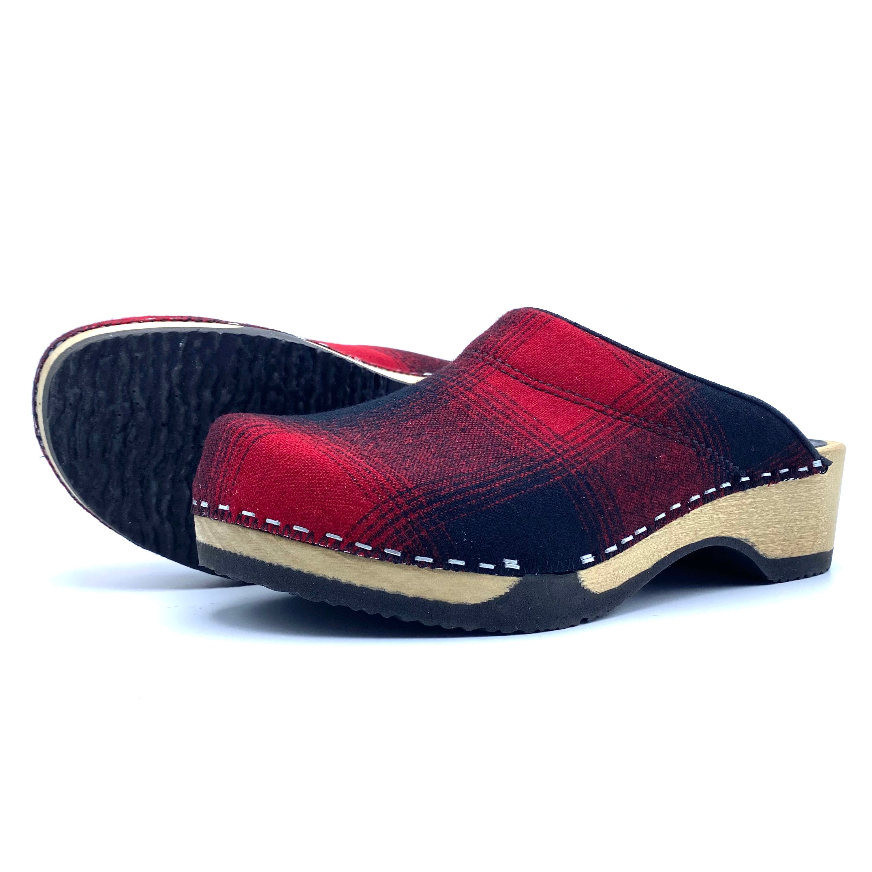 Red and black plaid clog shoe on a white background
