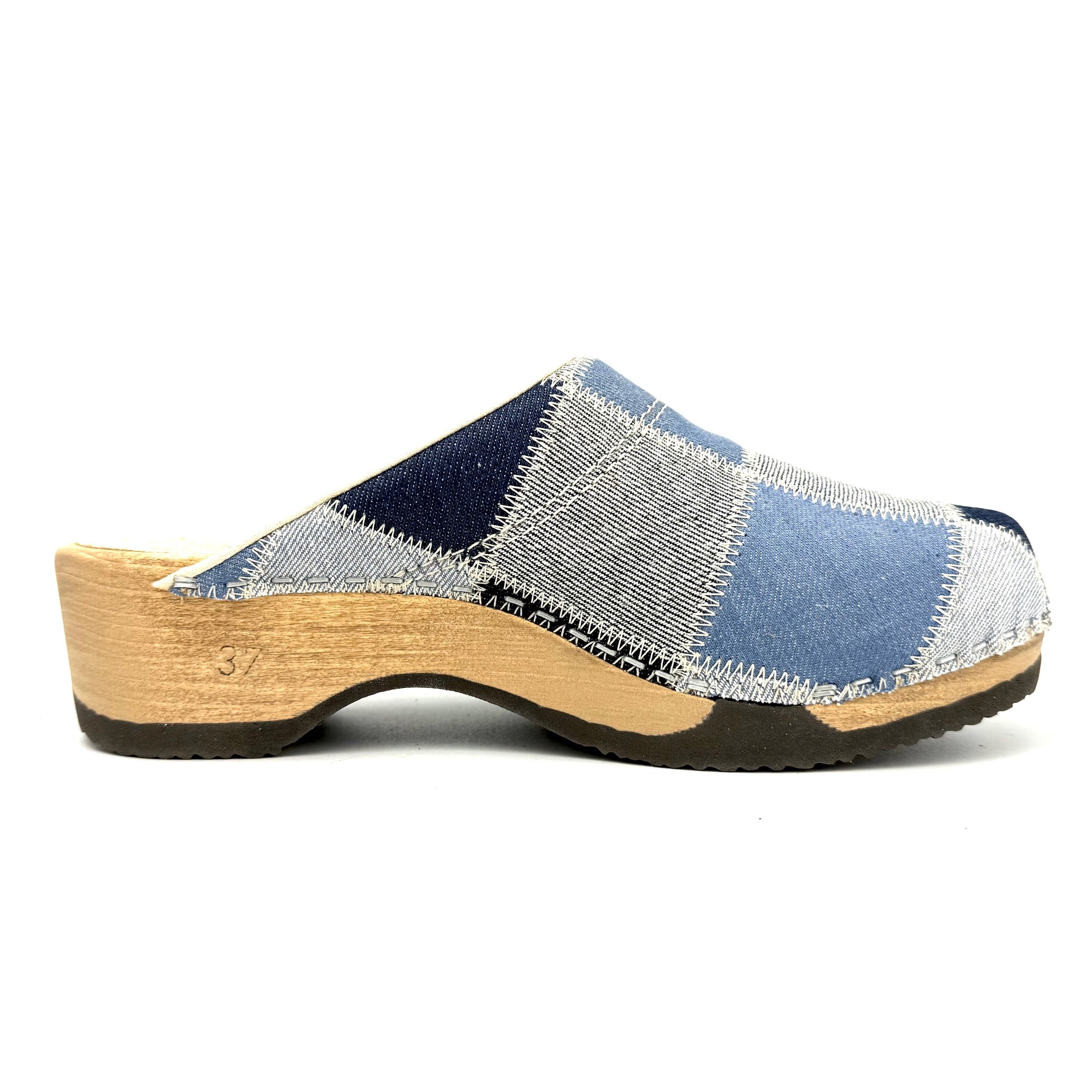 Blue and white patchwork clog shoe on a white background