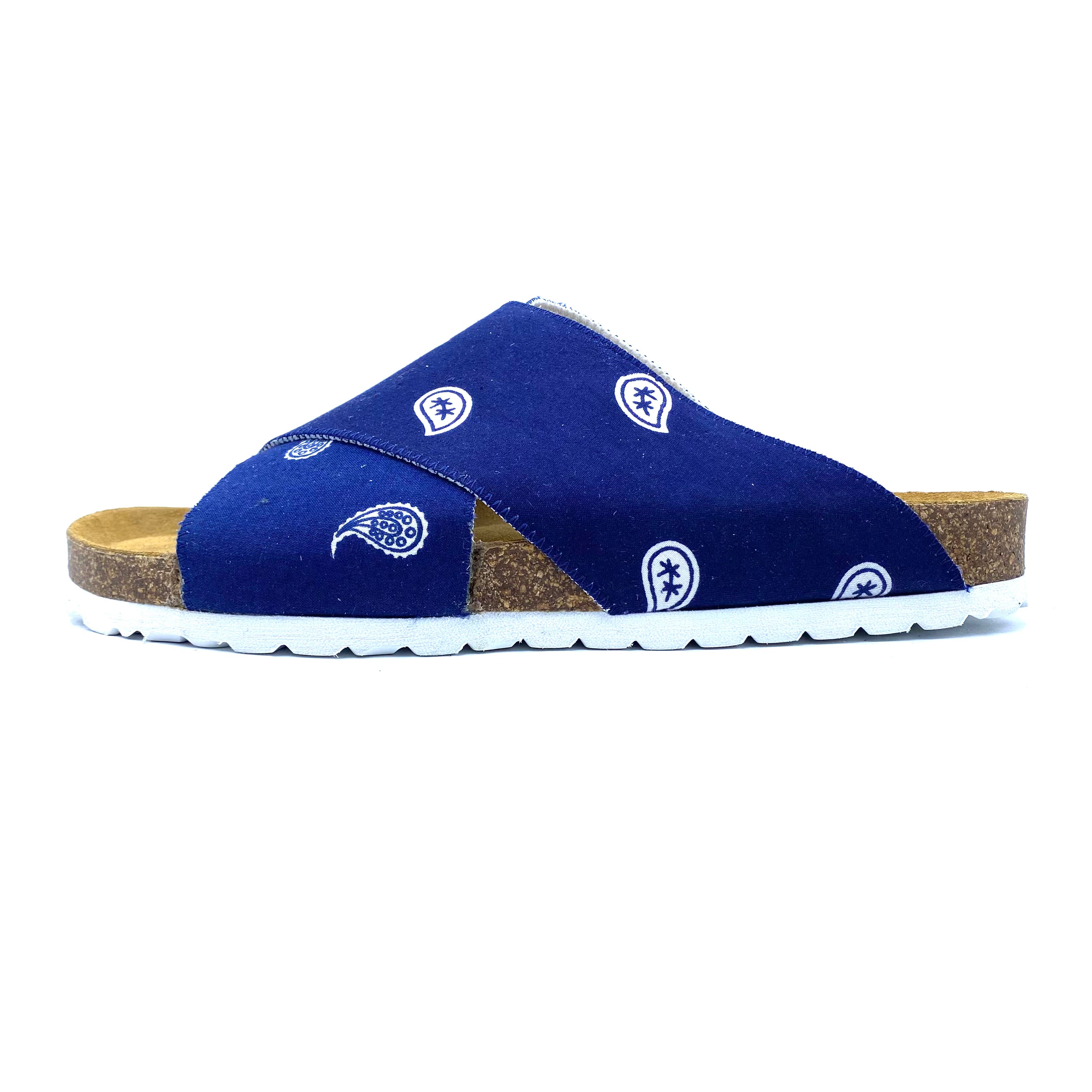 Blue sandal with white patterns on a white background