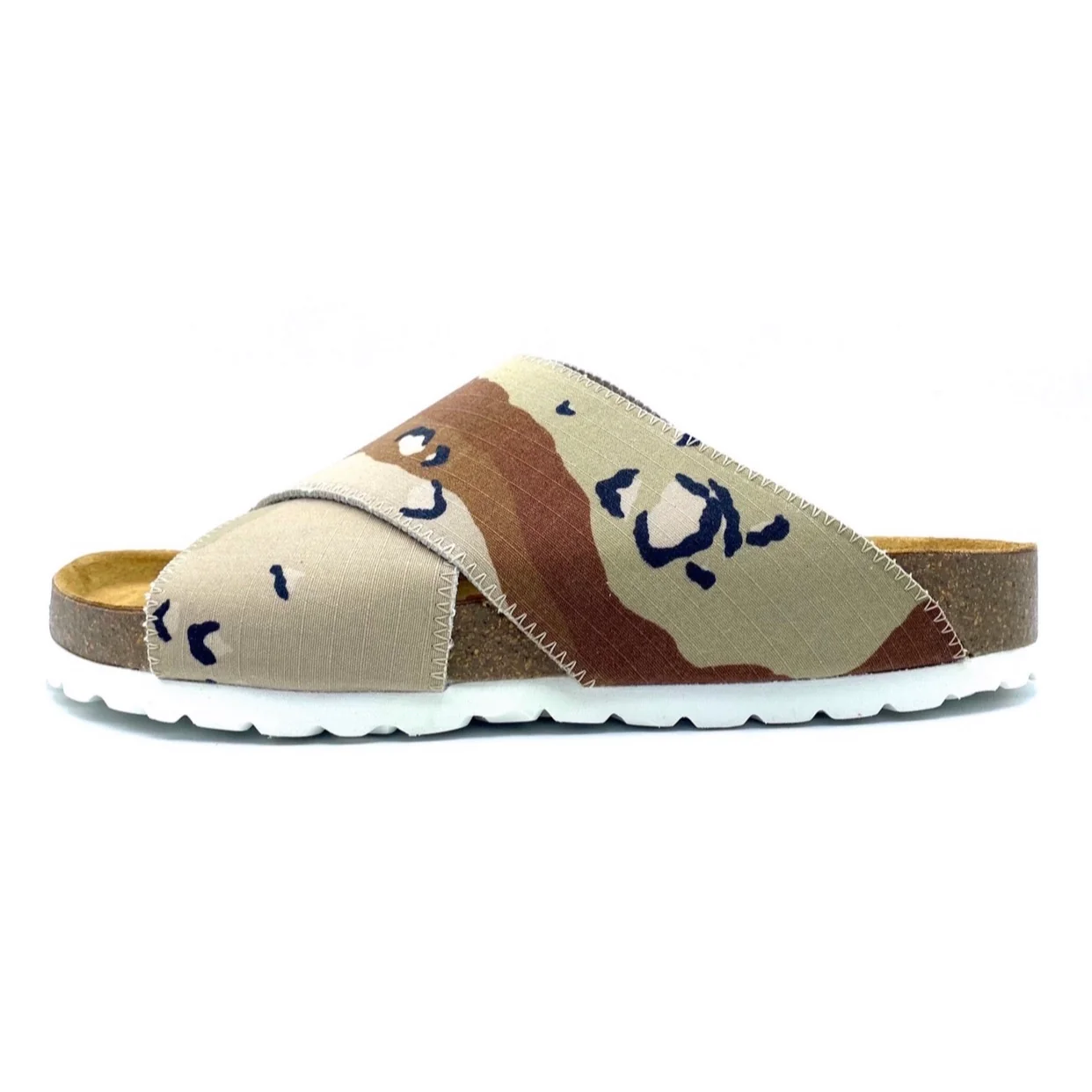 Camouflage-patterned sandal with white sole on a white background