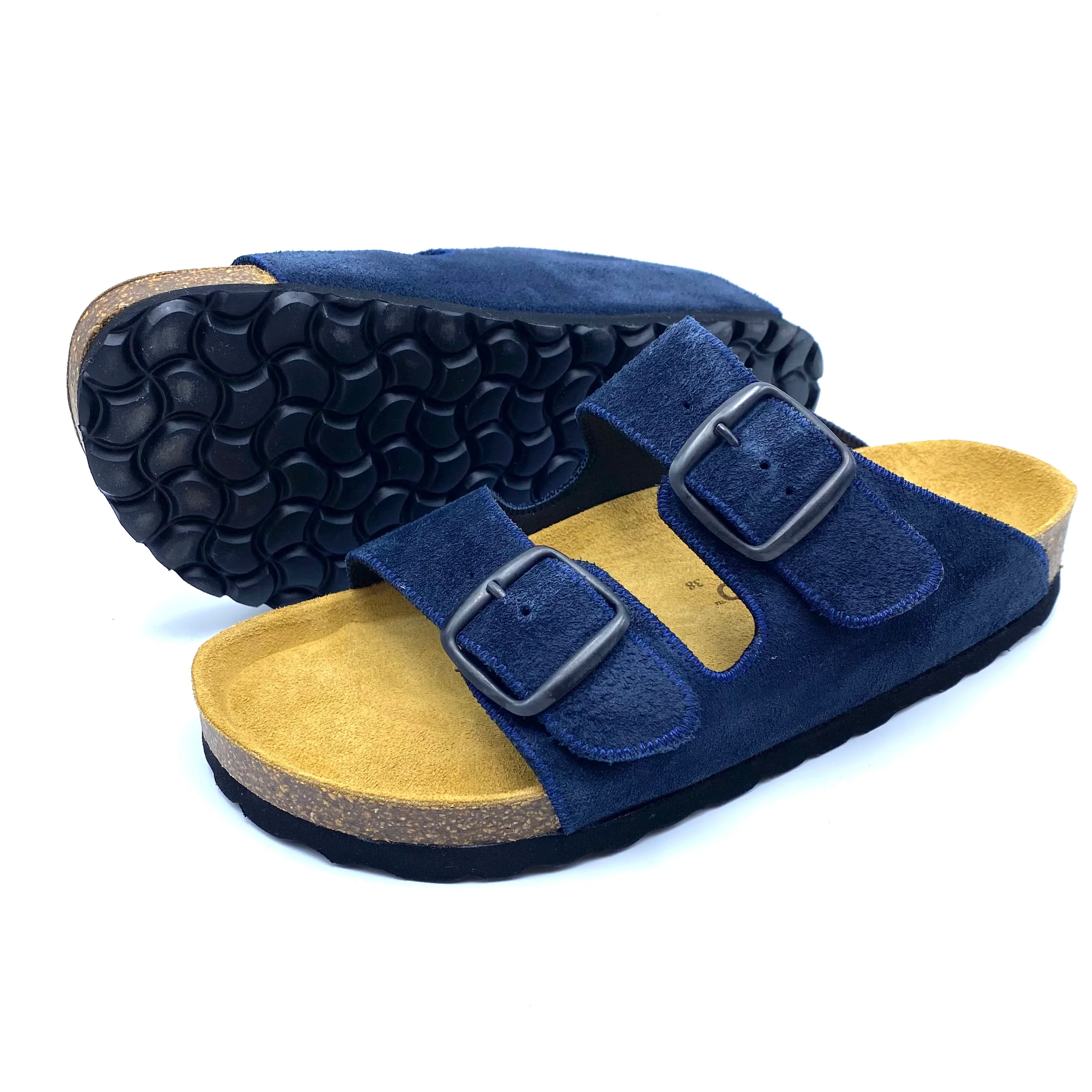 Blue sandals with yellow soles on a white background