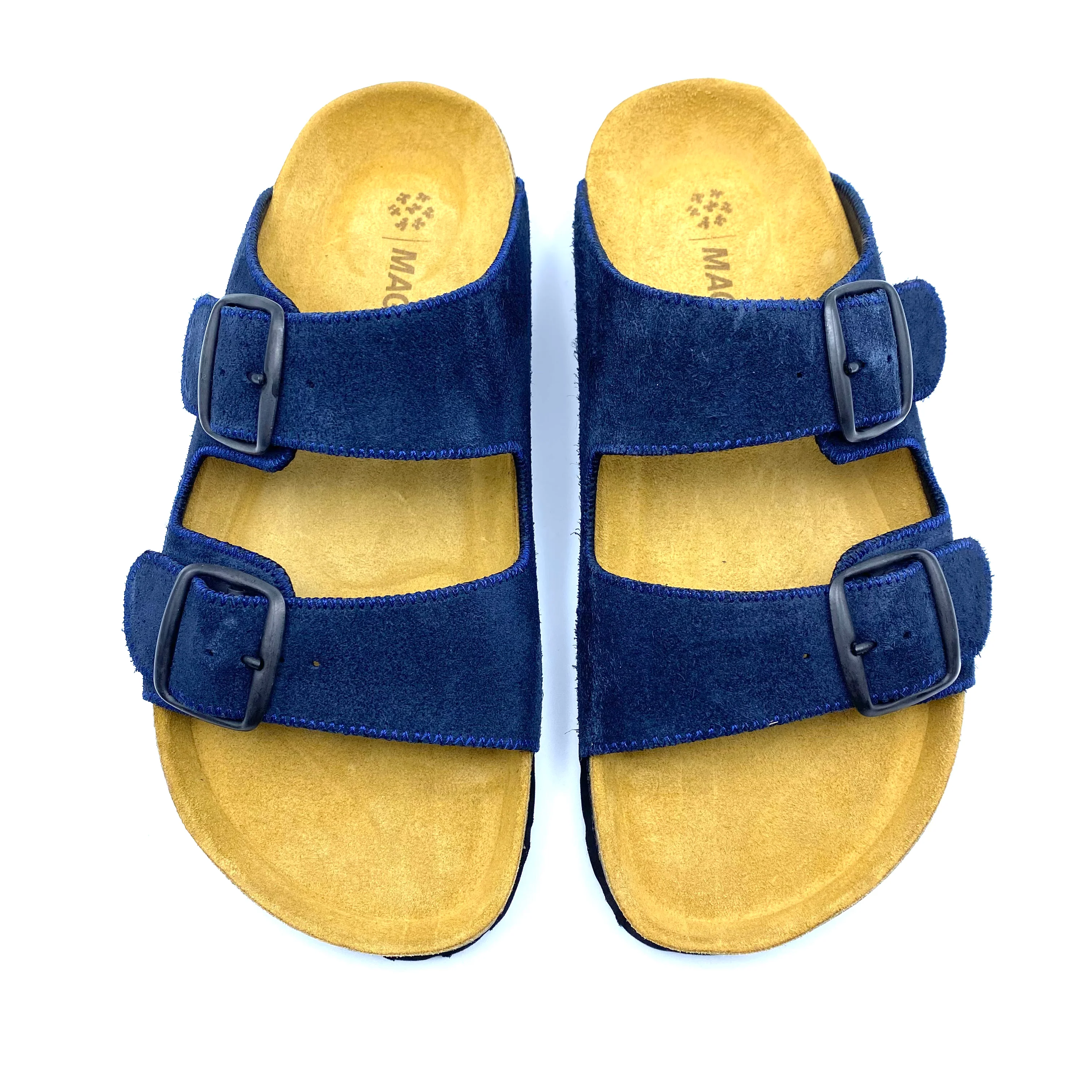 Pair of blue sandals with yellow soles on a white background