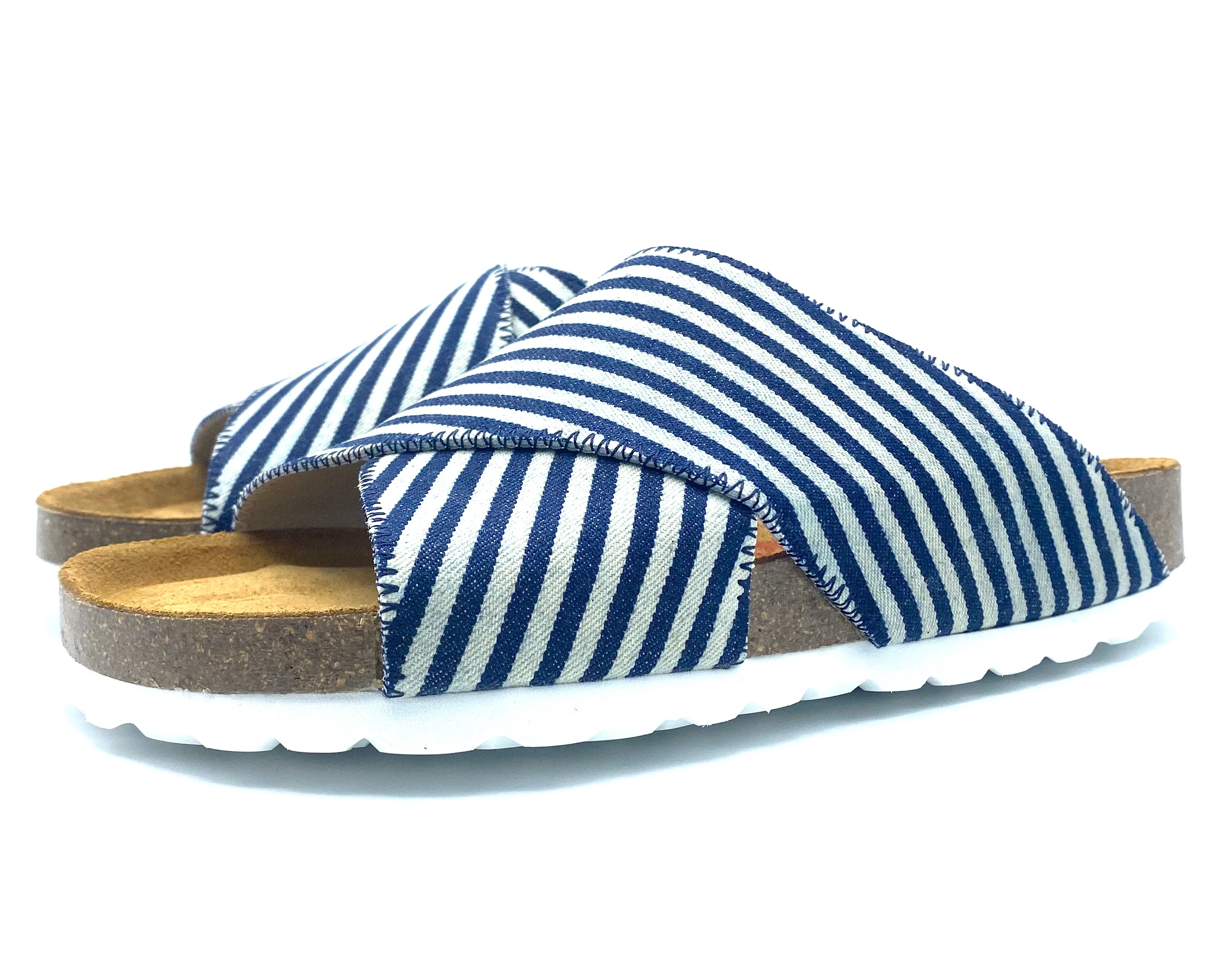 Blue and white striped sandals with cork sole on a white background