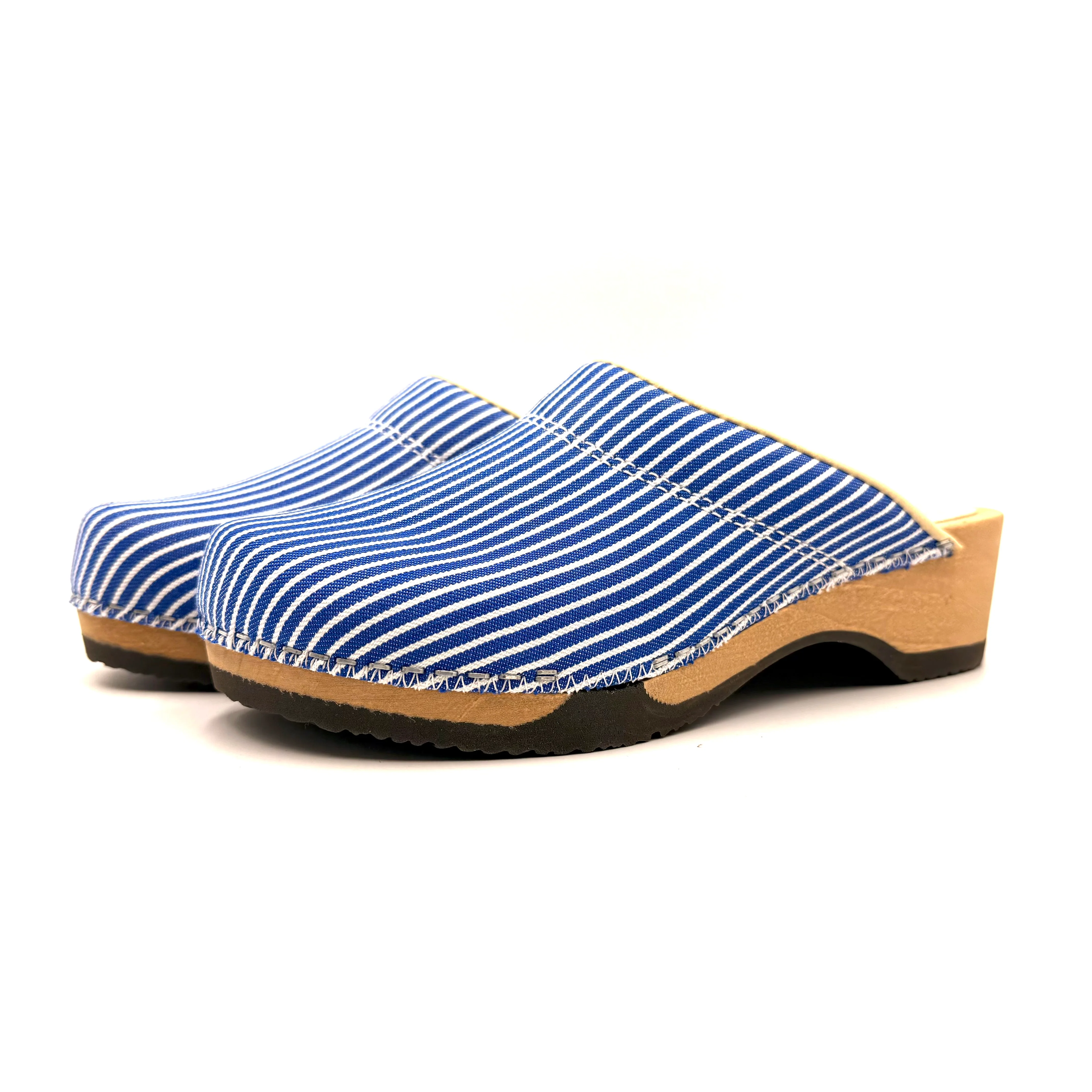 Pair of blue striped clogs on a white background