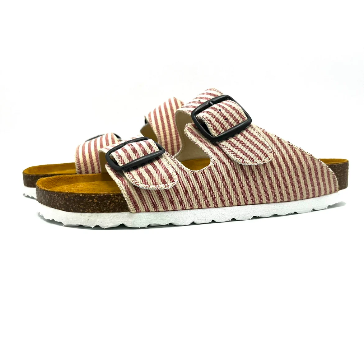 Pair of striped sandals with brown buckles on a white background