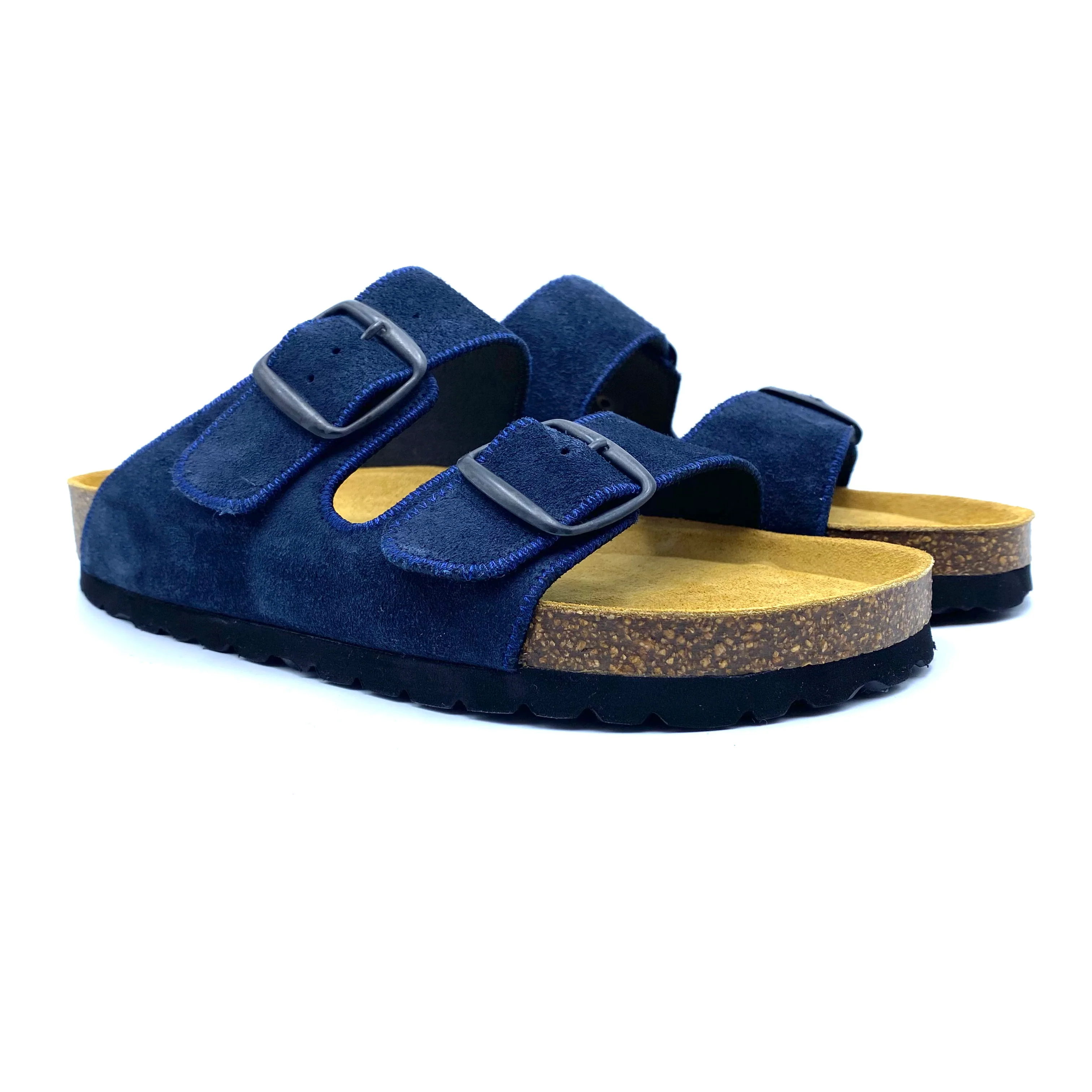 Pair of blue sandals with cork insoles on a white background