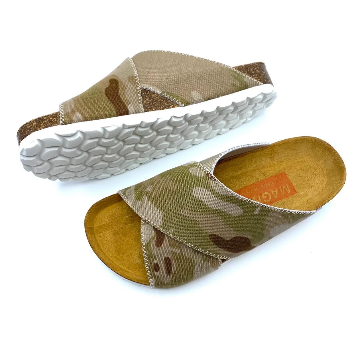 Camouflage-patterned slippers with white sole and brown insole on a white background