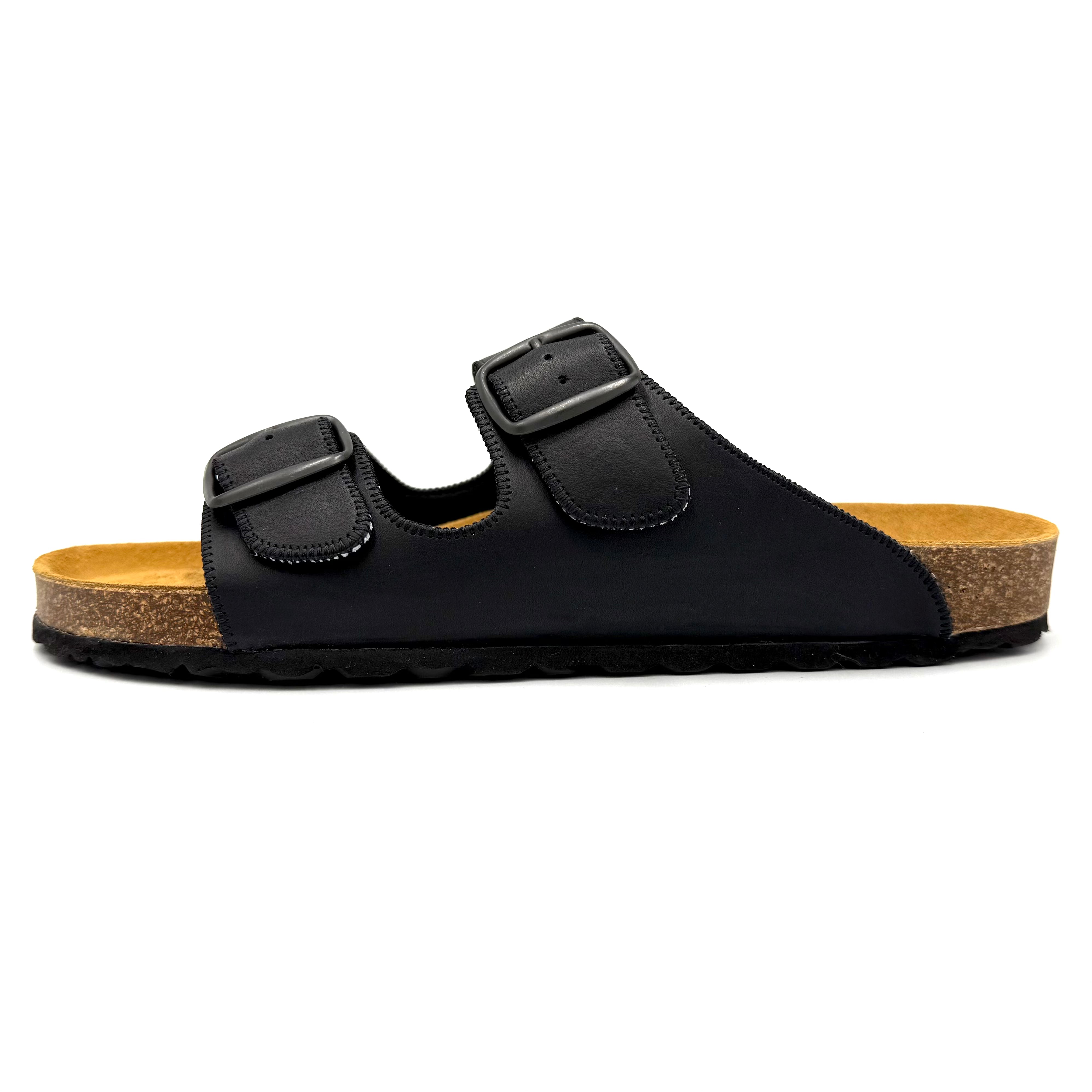 Black sandal with cork sole on a white background
