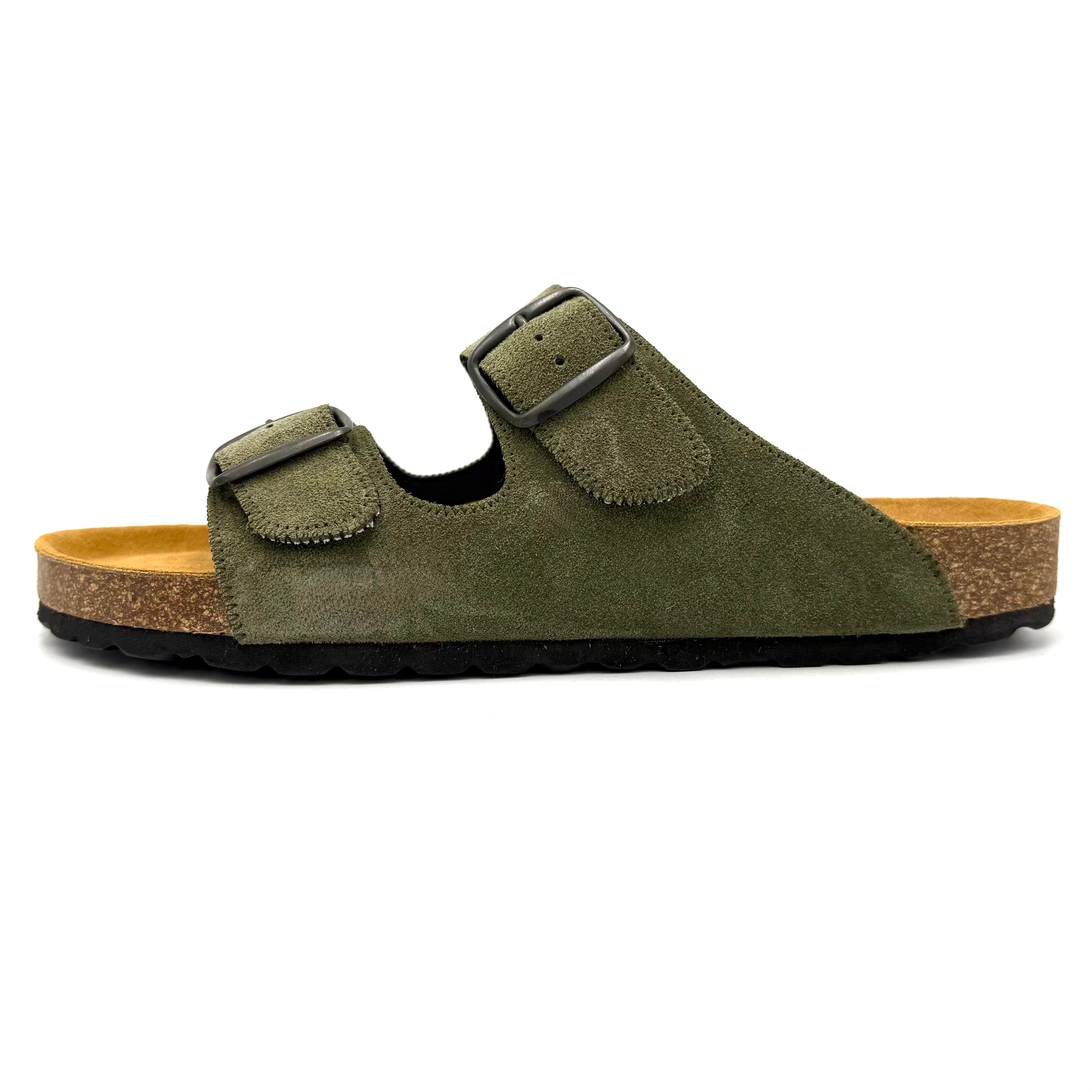 Green sandal with cork sole on a white background