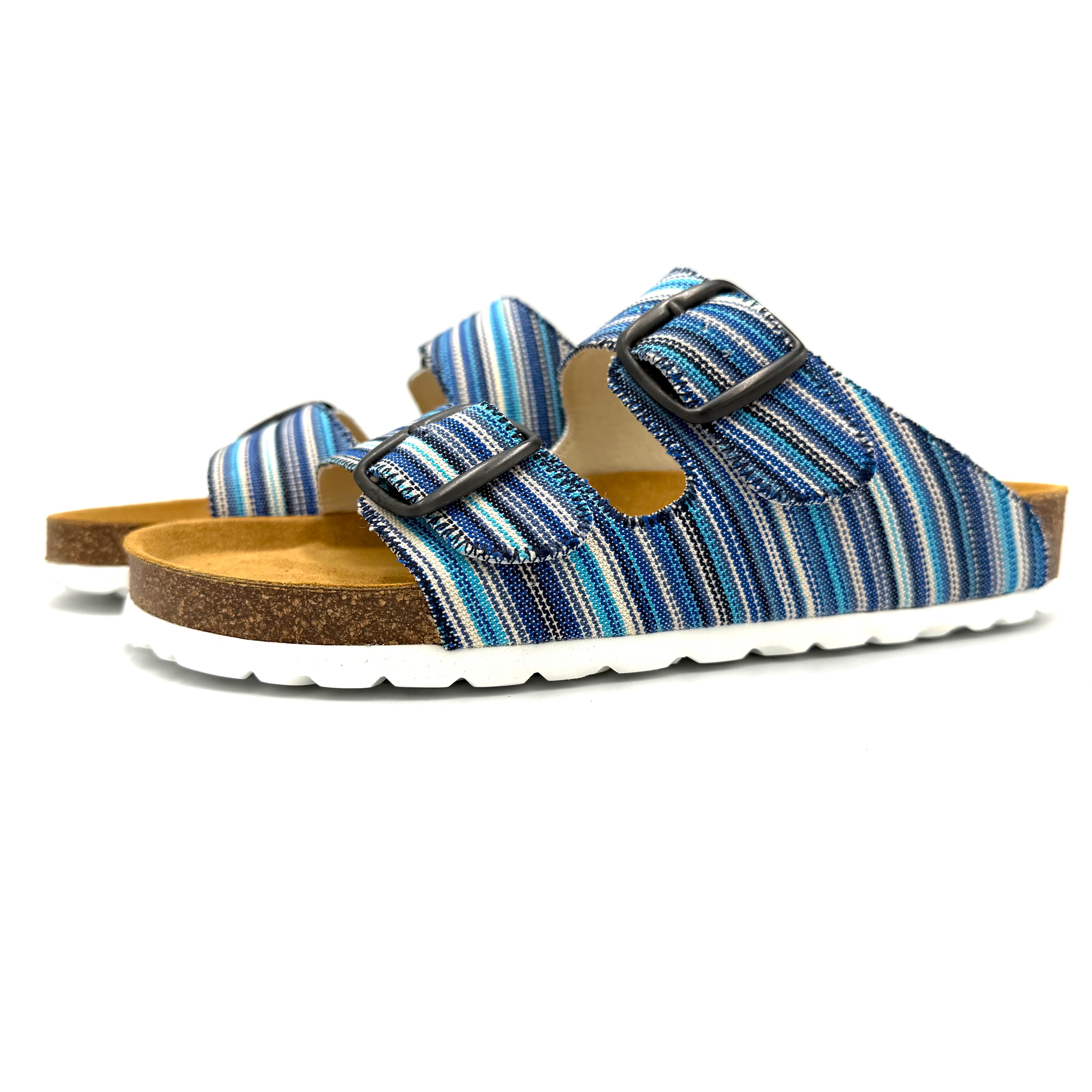 Blue striped sandals with cork sole on a white background