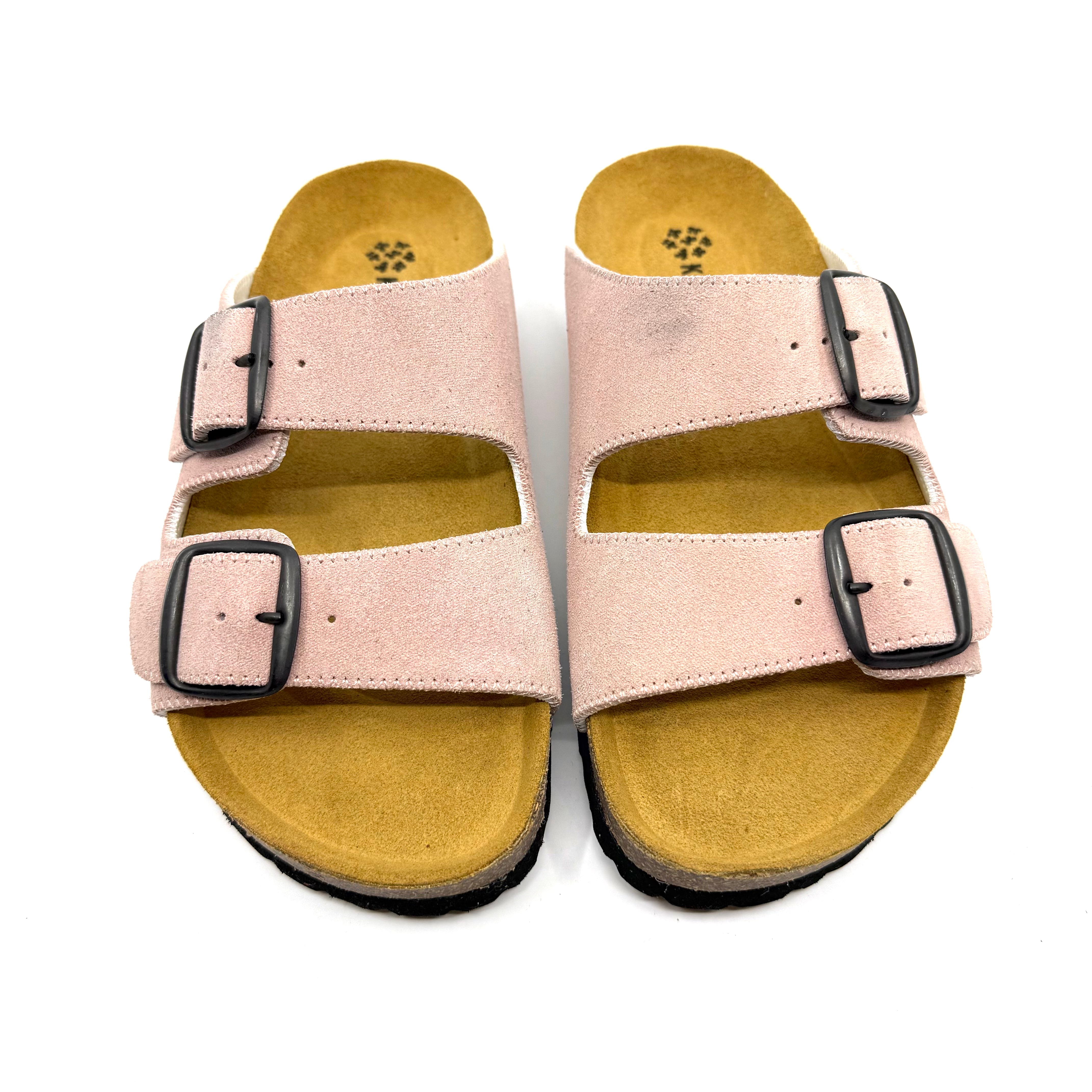 Striped sandal with a buckle on a white background