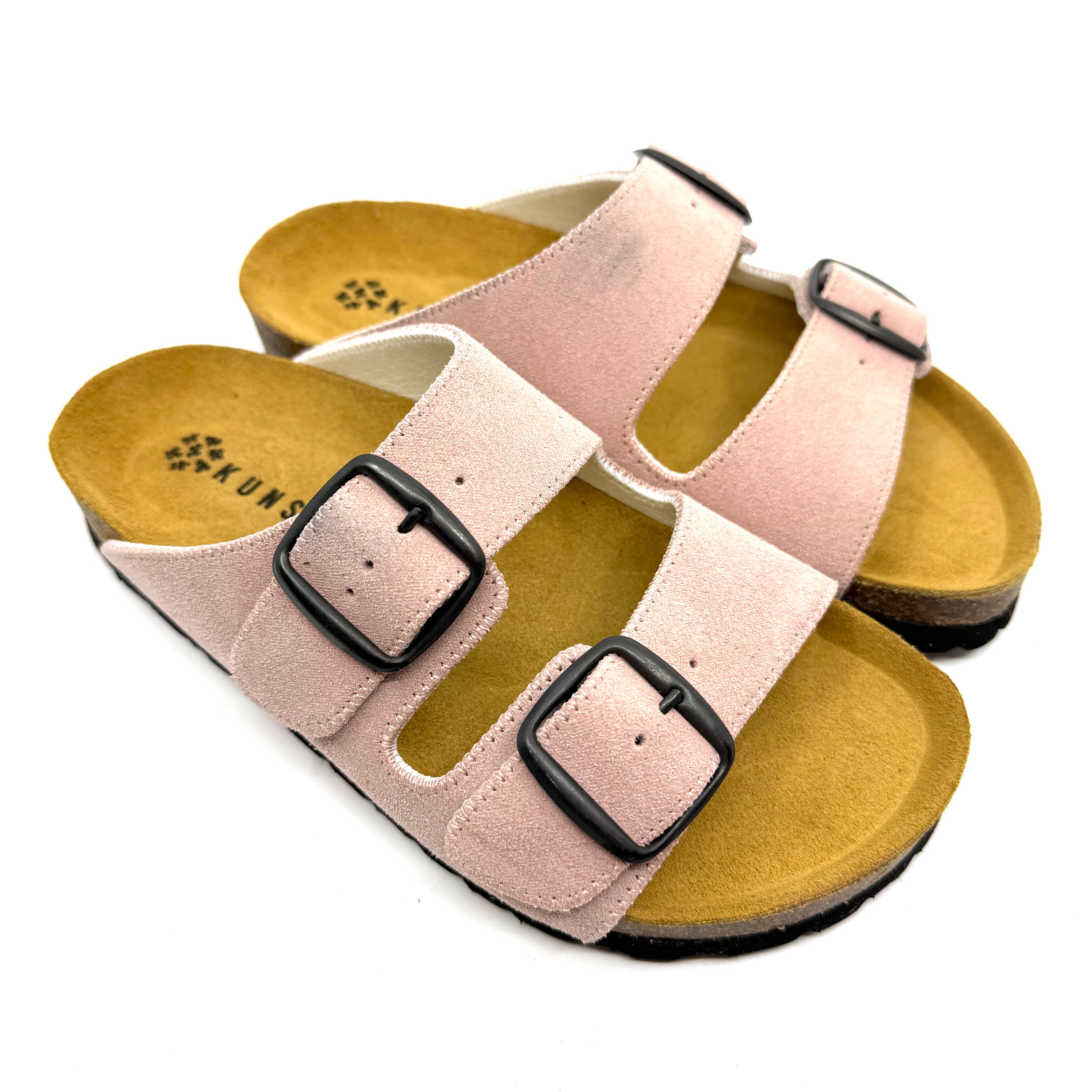 Striped sandal with a buckle on a white background