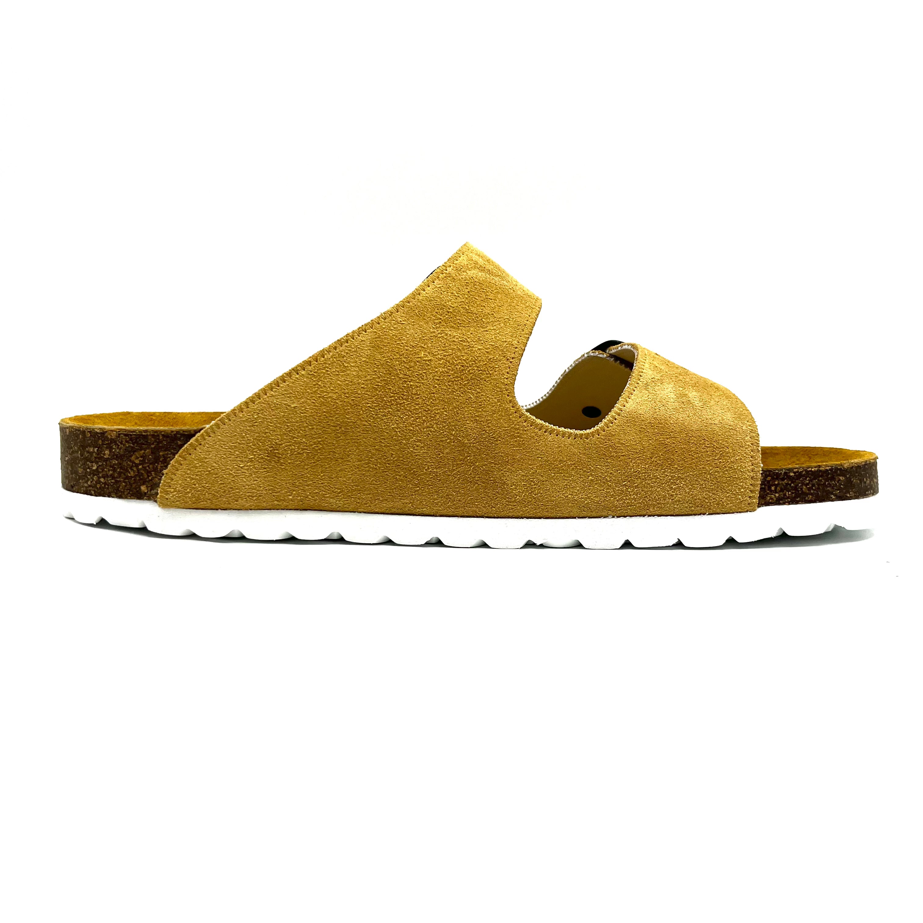 Yellow sandal with black buckles on a white background