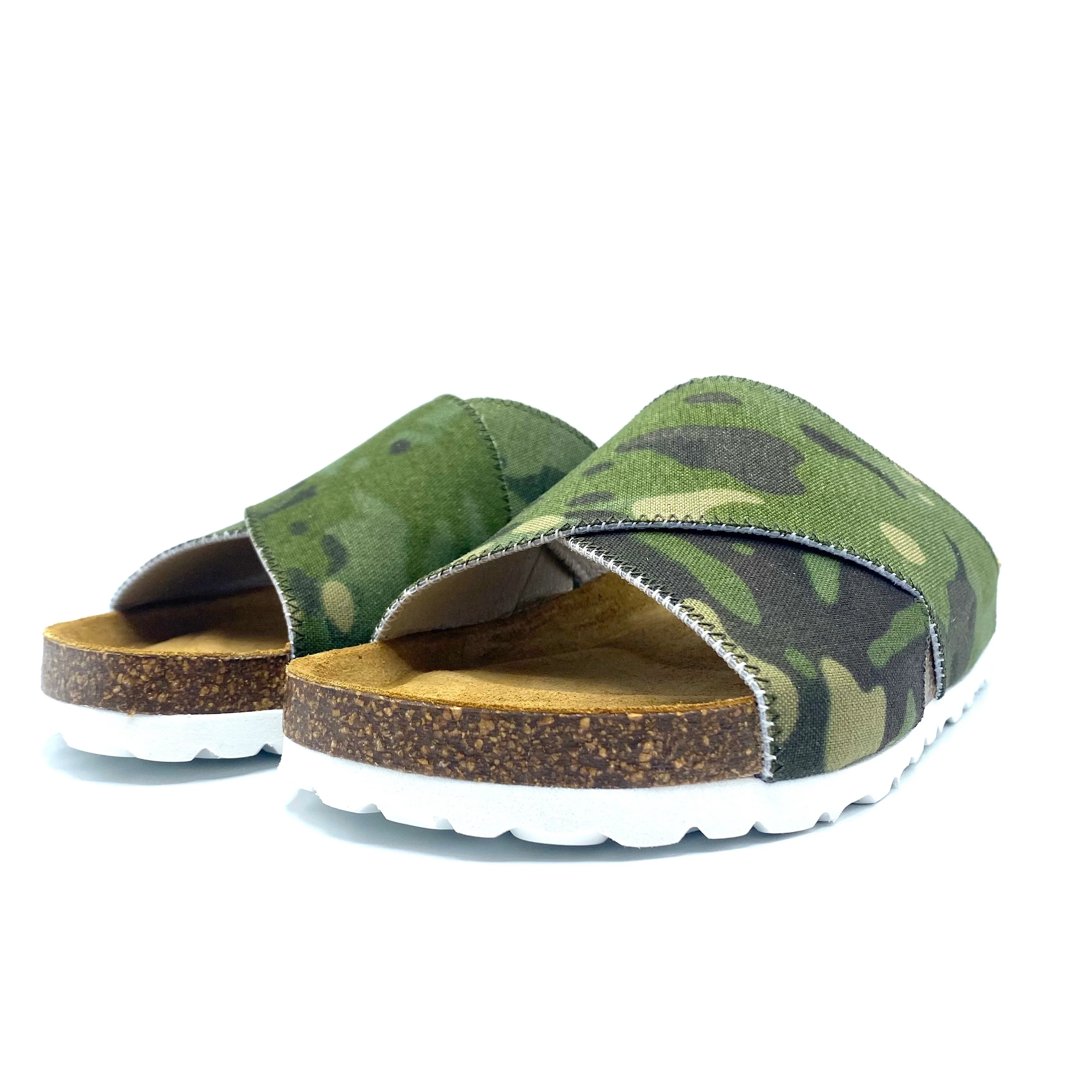 Camouflage-patterned sandals with cork sole on a white background